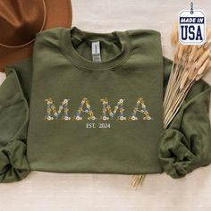 Embroidered Mama Crewneck Sweatshirt, Personalized Est Date Floral Mama Sweatshirt, New Mom Pullover Flower Sweater, Birthday Gift for Mom Discover our dedication to exceptional quality and personalized style! 🌟 Don't miss out on our amazing 70% off all items in our collection! 🛍️⏳ This limited-time offer won't last, so act fast. Spread the happiness with your loved ones and create treasured memories with our beautifully crafted products. ❤️🎁 🔔 Note: This price is for one individual item. To order a set of "2 items," please add 2 items separately and proceed to checkout. 🛒 PRODUCT HIGHLIGHTS: T-SHIRT: ♦ 4.5-ounce, 100% ring spun US cotton 👕 90/10 ring spun cotton/poly (Antique Cherry Red, Antique Heliconia, Antique Sapphire, Sport Grey) ️ 50/50 ring spun cotton/poly (Graphite Heather Fall Birthday Cotton Sweatshirt, Spring Long Sleeve T-shirt With Letter Embroidery, Fall Birthday Crew Neck Tops, Birthday Embroidered Text T-shirt With Crew Neck, Birthday Crew Neck T-shirt With Embroidered Text, Green Spring Birthday Top, Long Sleeve Fall Birthday Sweatshirt, Mother's Day Embroidered Text Crew Neck Top, Mother's Day Crew Neck Top With Embroidered Text