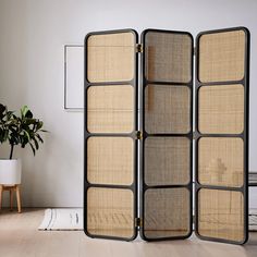 the room divider is made out of woven fabric