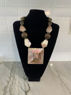 Gorgeous vintage (likely Art Deco) mother of Pearl shell necklace. Chunky statement piece. Gorgeous iridescent color with brass clasps and beads. Iridescent Color, Bonita Springs, Mother Of Pearl Necklace, Necklace Chunky, Shell Necklace, Pearl Shell, Shell Necklaces, Name Necklace, Stone Necklace