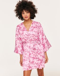 The Izabella Robe is the perfect piece of sleepwear for your romantic moments. Made with soft and luxurious satin this robe features a self-tie closure. (Available in sizes XS-XL.) Feminine V-neck Robe For Sleep, Spring Satin V-neck Robe, Floral Print Satin Sleepwear For Loungewear, Tie Waist Kimono For Loungewear, Feminine Floral Print Robe For Loungewear, Feminine Satin Robe For Loungewear, Satin Floral Print Sleepwear, Pink Spring Robe For Bedtime, Pink Summer Robe For Bedtime