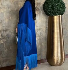 Fringe Floor-length Maxi Dress, Party Long Sleeve Maxi Dress With Tassels, Long Sleeve Maxi Dress With Tassels For Party, Evening Kaftan With Tassels, Tassel Dress For Eid Party, Party Dress With Tassels For Eid, Party Dresses With Tassels For Eid, Elegant Long Maxi Dress With Tassels, Blue Party Thobe Maxi Length