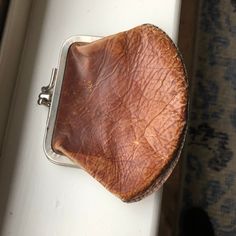 Such a cool old double-compartment coin purse! Made of leather & metal, the leather is wonderfully aged and the metal clasp has a patina of rust. Purse is 4-3/4 x 3-1/2 inches; circa 1910-20. Other items are not included. Visit my shop! www.veraviola.etsy.com Vintage Brown Wallets With Card Slots, Vintage Compact Coin Purse With Card Slots, Vintage Wallet With Coin Pocket, Vintage Wallets With Coin Pocket For Everyday, Vintage Coin Purse For Everyday Use, Vintage Brown Wallet With Coin Pocket, Vintage Compact Coin Purse For Everyday, Brown Vintage Wallet With Coin Pocket, Vintage Brown Wallets For Gifts