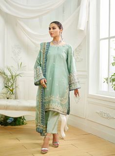 3 Piece Embroidered Suit for Women Description : This three-piece luxury design is crafted on fine fabric featuring alluring embroidery on shirt and dupatta with the look being completed with plain straight pants. Fabric: Cotton Organza Country of Origin : Pakistan General Care Instruction : Hand Wash recommended or dry clean. Color may bleed so please be mindful of other items with it. General Disclaimer   --  Size chart provides reference sizes and actual sizes might be slightly different from the size chart.   --  Actual colors of the outfit may vary from the colors being displayed on the screen Anarkali Suits With Dupatta For Eid, Unstitched Bollywood Suits With Dupatta, Cambric Palazzo Set With Dabka Work, Festive Cambric Palazzo Set With Intricate Embroidery, Designer Cambric Set With Intricate Embroidery, Formal Sets With Intricate Embroidery Unstitched, Formal Chikankari Embroidered Lawn Suit, Eid Semi-stitched Embroidered Suit, Festive Suits With Dupatta For Eid