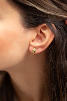 Embrace serpent chic with our snake earrings, a stylish accessory that adds a touch of reptilian allure to your look. Capture boho vibes with dainty snake earrings, perfect for those who appreciate a hint of edgy elegance in their jewelry.  Adorn your ears with reptilian glam using sterling silver snake earrings, a glamorous choice for those seeking a mystical appeal. Make a statement with gold snake earrings, exuding exotic allure and adding a touch of wild glam to your ensemble.  Experience ed Snake Earrings Silver, Snake-shaped Single Earring As Gift, Elegant Yellow Gold Snake Earrings, Elegant Snake-shaped Single Earring, Gold Snake Earrings, Snake-shaped Yellow Gold Earrings For Gift, Yellow Gold Snake-shaped Earrings Gift, Gold Snake-shaped Earrings With Pierced Ears, Serpent Jewelry