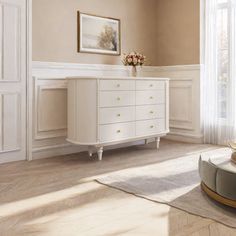 a living room scene with focus on the dresser and coffee table in the centerpiece