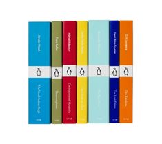 the penguin books are lined up in different colors