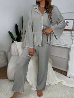 Elevate relaxation with our 2-piece Contrast Binding Casual Lounge Set. Effortless style meets comfort in this knitted polyester ensemble. Express yourself in a plain pattern with pocket and button front details. Loose fit & medium stretch ensure all-day ease. Long sleeves for extra coziness. Easy care with machine wash or dry clean. Unwind fashionably. Features: Style: Casual-Comfy Pattern Type: Plain Type: Pant Sets Details: Pocket, Contrast Binding, Button Front Sleeve Length: Long Sleeve Fit Gray Loungewear Sets With Pockets, Daywear Sets With Pockets And Long Sleeves, Relaxed Fit Loungewear Set With Pockets, Long Sleeve Loungewear Sets With Button Closure, Casual Loungewear Sets With Button Closure, Solid Color Button-up Sets With Pockets, Casual Gray Sets With Pockets, Casual Daywear Sets With Buttons, Solid Color Sets With Button Closure For Loungewear