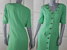 This German vintage green dress has a V neckline, and closes in the front with eight black and gold buttons. Three more of these buttons are decorative and are positioned on the right side of the V neckline, with three imitation black buttonholes on the left side of the V neckline. This stunning slimline knee-length dress has two imitation flap hip pockets. The summer dress has padded shoulders and short sleeves. The high-quality dress is fully lined in green 100% acetate material. Brand label: Green V-neck Dress With Buttons, Classic Green Dress With Buttons, Classic Green Dress With Button Closure, Green Button-up Dress With Button Cuffs, Green Short Sleeve Dress With Buttons, Elegant Green Dress With Button Closure, Vintage Green Dress For Work, Vintage Green Dress, Country Dresses