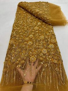 This high quality Fabric is measured in 5 Yards With Embroidered Beading and Sequin. It is soft, very delicate and beautiful. This high Quality Fabric is made with Fashion embroidered rhinestones can be used in making party wedding dresses, skirts, shawls, scarves and other other fashion apparels as you would like. Size : Length : 5 yards (180 inch). Width: 50 inch (Please allow slight deviation for the measurement data ,±1 inch) Material: 100% Polyester, Tulle Lace Fabric, Eco-Friendly embroide Luxury Embroidered Lace, Golden Fabric, Creative Jewelry Photography, Lehenga Designs, Jewelry Photography, Handmade Fabric, Creative Jewelry, Tulle Lace, Vintage Fabrics