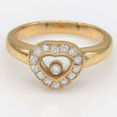 Treat Yourself To A Sparkle Of Luxury With This Authentic Vintage Chopard Diamond Happy Heart Ring. The 18k Yellow Gold Is Known For Its Strength And Radiant Shine, While Fifteen Diamonds Bring Joy And Happiness. Enjoy Excellent Customer Service With Every Purchase - We Know That Your Satisfaction Is Our Priority! Brand: Chopard Collection: Happy Diamond Heart Metal: 18k Yellow Gold Heart Measurement: 10mm X 10mm Diamonds: Approximate 1/2 Carat Total Round Cut E-F Vs Weight: 6 Grams Hallmarks: C Chopard Jewelry, Happy Heart, Joy And Happiness, Gold Heart, 2 Carat, Diamond Heart, Heart Of Gold, Womens Jewelry Rings, Special Offer