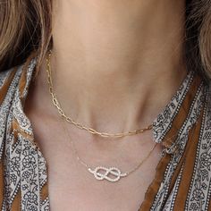 "Feminine and beautiful Large infinity knot diamond necklace  in the video this necklace is the large knot diamond necklace.     D E T A I L S : ♥ Natural diamonds, conflict-free, 0.95 carat, F color, VS clarity. ♥ Gold: 14K solid gold. Yellow gold,  white gold or rose gold. ♥ Pendant size: 30mm. ♥ Chain Length: 42cm chain. Please select your wanted chain length and gold color in the drop-down menu. ♥️♥️♥️ Service ♥️ Free IGL Jewelry Certificates: including evaluation for insurance; the certificate is free of charge if you request it when placing your order. (Takes additional two business days). ♥️ Lead time: please allow 3-5 weeks; all items are handmade per order. ♥️ Free Shipping: This item is shipped with express shipping within 3-5 business days at no extra charge. ♥️ Luxury packaging Pendant Necklace White Gold, Necklace Diamond Pendant, Celtic Knot Jewelry, Necklace White Gold, Infinity Knot, White Gold Necklace, Jewelry Knots, Necklace Love, Necklace Diamond