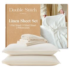 the linen sheet set is folded up and ready to be put into bedding sheets