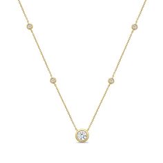 Celebrate any occasion with this certified lab-created diamond station necklace. Sterling silver with 14K gold plate A 1/2 ct. lab-created diamond is bezel set at the center Smaller lab-created diamond stations sparkle along the chain Certified lab-created diamonds; I color/SI2 clarity with certification card 5/8 ct. t.w. of lab-created diamonds 16.0- to 18.0-inch adjustable cable chain; spring-ring clasp Station Necklace, Bezel Diamond, Lab Created Diamonds, Cable Chain, Bezel Setting, Spring Rings, Gold Plate, Sparkle, Thing 1