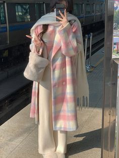 Bring some color into winter with this Long Plaid Rainbow Coat! This coat adds a vibrant touch to any cold-weather look, making it a stylish choice for any wardrobe. Size Chart: Size Bust (cm) Shoulder (cm) Sleeve (cm) Length (cm) Bust (in) Shoulder (in) Sleeve (in) Length (in) S 100 60 42 90 39.37 23.62 16.54 35.43 M Korean Fashion Office, Pink Winter Coat, Winter Mode Outfits, Woolen Coat Woman, Mode Hijabi, Modest Outfit, Uni Outfits, Long Coats, Long Coat Women