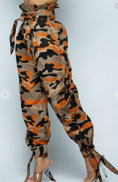 Orange Washed Camo Baggy Pants Runs Small Khaki Harem Pants With Elastic Waistband For Fall, Fall Khaki Harem Pants With Elastic Waistband, Trendy Fall Ankle-length Parachute Pants, Fall Camouflage Parachute Pants With Cargo Pockets, Brown Parachute Pants For Fall, Fall Camouflage Trousers, Camouflage Pants With Side Pockets For Spring, Spring Camouflage Pants With Side Pockets, Camouflage Pants With Elastic Waistband For Streetwear