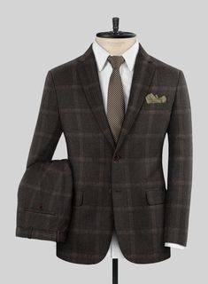 Presenting our esteemed Loro Piana Vittoria Wool Suit—an embodiment of timeless elegance paying homage to classic aesthetics while exuding a distinctive charm. Crafted from superfine merino wool, this exceptional ensemble features an artful fusion of plaid patterns expertly woven against a rich brown backdrop, imparting an undeniable air of confidence. For those in pursuit of a standout sartorial statement, this suit is the epitome of refined conversation.   Choice of the Elite, Loro Piana is ow Elegant Wool Tweed Jacket For Business Casual, Elegant Wool Tweed Jacket With Welt Pockets, Elegant Tailored Brown Tweed Jacket, Elegant Custom Fit Wool Suit, Elegant Wool Suits With Custom Fit, Elegant Tweed Jacket For Business, Elegant Business Tweed Jacket, Classic Fitted Wool Tweed Jacket, Elegant Wool Tweed Jacket With Notch Lapel