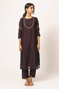 Wine kurta with all-over floral motif work. Comes with straight pants.
Components: 2
Fabric: Chanderi
Neckline: Round
Sleeve Length: Three Quarter
Color: Purple
Embroidered
Side slits
 - Aza Fashions Kurta Set For Women, Kurta Set, Straight Pants, Set For Women, Aza Fashion, Floral Motif, Three Quarter, Color Purple, Cold Shoulder Dress