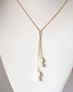 2 stacked mother of Pearl pikake flowers 17" + 1 " extender 14kt gold filled chain Delicate White Dangle Lariat Necklace, Delicate White Adjustable Drop Necklace, Delicate Adjustable White Drop Necklace, Adjustable White 14k Gold Filled Necklaces, Adjustable White 14k Gold-filled Necklace, White Adjustable Lariat Drop Necklace, Adjustable White Lariat Drop Necklace, Dainty White Adjustable Drop Necklace, White Adjustable Long Drop Necklace