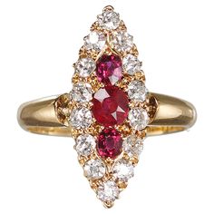 A Victorian ruby, diamond and gold navette shaped cluster ring, with a cushion shaped faceted ruby, in the centre of two oval rubies, surrounded by fourteen old-cut diamonds, in a claw set navette shaped cluster, with a pierced crown gallery, onto a plain polished shank, mounted in 18ct gold, with a Chester Hallmark, with an A date letter for 1901. The assaying of items in Chester can be dated as far back as the 15th century, although it was in the 17th century that Chester was granted an Assay Office by Act of Parliament. The earliest recorded dated Assay Office marks are for 1680. The first date letter was introduced for 1701. The Assay Office closed on 24th, August, 1962. Due to the closure items bearing a Chester Hallmark are considered rare and sought after. 24th August, Diamonds And Gold, Ruby Diamond, 15th Century, 17th Century, Cluster Ring, Chester, Cocktail Rings, Gold Diamond