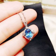 Welcome to Elegant Art Jewelry!  Stone: Natural Swiss Blue Topaz Stone Size: 8mm×10mm Side Stone: Zircon Metal: 925 Sterling Silver Personalization: 9K/14K/24K/GOLD/SILVER/PLATINUM/ROSE-GOLD/WHITE GOLD. (Contact me)  Blue Topaz Pendant, Blue Topaz Cuff Pendant, 925 Sterling Silver Pendant, Oval Shape Pendant, Blue Topaz Pendant, Blue Topaz Engagement, Open Design Pendant, Blue Topaz Oval, Emerald Blue Topaz, Blue Topaz, Blue Gemstone, Gemstone Pendant, Blue Topaz Pendant, Bridesmaid Gift, Birthd Blue Oval Topaz Necklaces, Blue Topaz Oval Necklaces, Blue Topaz Oval Necklace, Silver Pendent, Engagement Necklaces, Necklace Luxury, Emerald Blue, Platinum Rose Gold, Blue Topaz Necklace