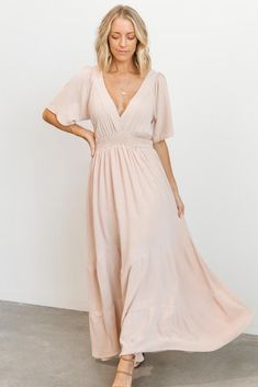 Say "Hello!" to the boho dress of your dreams!  High quality, knit material Deep v neckline in front and back of dress Lined to mid thigh Two tiered full skirt Smocked waist Bump and nursing friendly Bump friendly up to 29 weeks, we recommend sizing up after 29 weeks 100% rayon Trina is 5’6”, 32D cup, size 2 and wearin Sparkle Gown, Blush Maxi Dress, Sage Dress, Baltic Born, Shower Dresses, Family Photo Outfits, Dress Dusty, Picture Outfits, Satin Maxi Dress