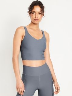 any color. small Sporty V-neck Activewear With Built-in Bra, Sporty High Stretch V-neck Activewear, V-neck Sports Bra With Light Support, Sporty Workout Tops With Built-in Cups, Sports Tops With Built-in Cups And Stretch, Solid Sports Bra With Built-in Cups For Workout, Athleisure Activewear With Built-in Cups, Compressive Activewear With Built-in Cups For Sports, Solid Color Sporty Activewear With Built-in Cups