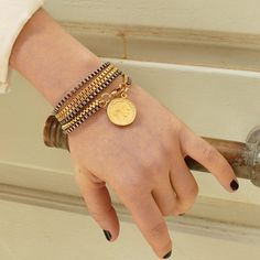 Beautiful wrap bracelet. Two layers of 3mm box chain, one gold plated and one silver plated wrapped three times around the wrist or one time around the neck as a necklace - super versatile and cool with gorgeous coin pendent.  ♥ Back to my shop: https://etsy.me/2RQXbkO ♥ Ready to Ship ♥ FREE SHIPPING Estimated shipping time: 8- 20 business days ♥ How will I get it?  Your item will arrive in a beautiful, labeled box packaging. If you are purchasing this as a gift you can ask us to add a personal Elizabeth Queen, Coin Charm Bracelet, Multi Chain Bracelet, Charm Bracelet Gold, Lucky Charm Bracelet, Gold Link Necklace, Coin Bracelet, Large Necklace, Silver Chain Style