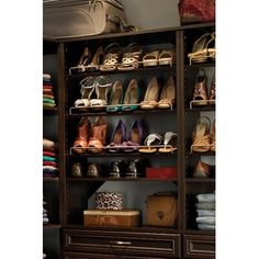 the closet is full of shoes and purses