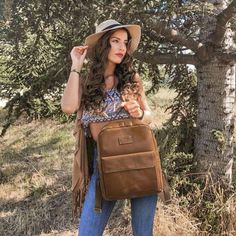 FEATURES MATERIAL: This backpack is handmade from 100% genuine leather (CRAZY HORSE LEATHER) with attention to every detail. SIZE: 11.8''(L)* 5.1''(W)* 14.2''(H), which fits up to 14" laptop & A4 books. STRAP: The adjustable length of this leather backpack shoulder straps is 24"/61cm-36"/91.4cm. WEIGHT: 2.99 lbs lbs/1.36 kg STRUCTURE: Outside of the bag: 1 Front magnetic pocket, 1 Back zipper pocket. Inside of the purse: 1 middle compartment with a padded laptop compartment, 1 big compartment wi Rectangular Leather Backpack For Trips, Leather School Backpack, Main 1, Light Backpack, School Backpack, Soft Towels, Crazy Horse, School Backpacks, Light Brown