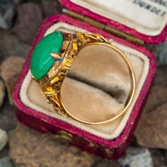 This beautiful ring features an oval cabochon cut chrysoprase with a detailed gallery and open gold work on the shoulders. It is crafted in 18k yellow gold and is currently a size 7.5. The ring shows a nice patina. Chrysoprase Ring, Gold Work, Beautiful Ring, The Ring, Oval Cabochon, Beautiful Rings, Work On, Patina, Yellow Gold