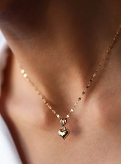 14k Gold  3D Heart Necklace, Puffy Heart Pendant with Sequin Chain, Real Gold Jewellery, Gift for Her, Price Performance Gold NecklaceMaterial: Solid GoldKarat: 14 K (585)Approximate weight : 1,56 Gr (16.8 inch Chain İncluded)Available in different chain lengths.As with all of our products, this item is handmade and made to order.Want to Check Out More from Our SectionsFİEMMA http://www.etsy.me/3ukWhjeGold Rings http://www.etsy.me/39E9NGSGold Necklaces http://www.etsy.me/31NdjtOGold Bracelets ht 14k Gold Pendant Charm Necklace For Valentine's Day, 14k Gold Heart Pendant Necklace With Adjustable Chain, 14k Gold Necklace With Heart Charm And Cut, 14k Gold Pendant Necklace For Valentine's Day, Valentine's Day 14k Gold Pendant Necklace, 14k Gold Charms Jewelry For Valentine's Day, Valentine's Day Gold Plated Heart Cut Necklace, Valentine's Day 14k Gold Jewelry With Charms, 14k Gold Heart-shaped Jewelry With Adjustable Chain