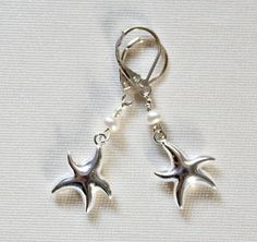 Silver Starfish Earrings,Pearl Starfish Wedding,Mothers Day form Daughter,Mothers Day from Husband,Mothers Day from Son,Kids,Beach Wedding by LeaningTreeDesigns on Etsy White Starfish Charm Earrings For Gift, White Starfish Charm Earrings As Gift, White Starfish Charm Earrings, White Sterling Silver Earrings With Star Charm, Starfish Earrings With Star Charm As Gift, Starfish-shaped Earrings With Star Charm For Gift, White Starfish Charm Star Earrings, White Star-shaped Earrings With Starfish Charm, Sterling Silver Starfish Earrings