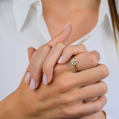 Shine bright with our Solid Gold Flower Ring - a stunning statement piece for nature lovers. This 14K dainty daisy ring is the epitome of elegance and style, perfect for daily wear or special occasions. Whether you prefer yellow, white, or rose gold, this minimalist beauty is a must-have for your jewelry collection. The Ring Details: ✦ Gold KT: 14k Solid Gold ✦ Choice of Gold Color: Yellow Gold, White Gold, Rose Gold ✦ Gem Stone: AAA Grade White Cubic Zirconia ✦ Ring Diameter: 7.80 mm ✦ Thicknes Gold Anniversary Rings, Gold Flower Ring, Minimalist Beauty, Daisy Ring, Nature Ring, Cubic Zirconia Rings, Delicate Rings, Flower Ring, Meaningful Gifts