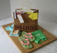 a cake made to look like a shopping bag with flip flops and sandals on it