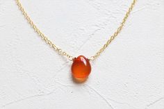 Crystal necklace of carnelian, perfect gift for bridesmaid, friends and family members. Size of pendant: about 10x12mm Length of necklace: Can be chosen from 14-30 inches ------------------------------------------------ Necklace and component options: ▲ 14 k gold filled ▲ 18 k gold plated brass base ▲ Silver plated brass base ▲ Antique plated brass base ------------------------------------------------ The price is for one necklace. Please kindly understand that every crystal is natural and they Carnelian Crystal Necklace Gemstone As Gift, Elegant Orange Healing Jewelry, Minimalist Amber Necklaces With Gemstone, Teardrop Agate Necklace For Gift, Dainty Carnelian Gemstone Jewelry, Elegant Carnelian Crystal Necklace Gift, Dainty Amber Pendant Necklace, Elegant Carnelian Crystal Necklace For Gift, Minimalist Orange Necklace As Gift