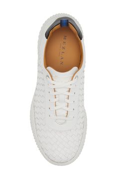 Mixed textures and a back pull-tab distinguish a contemporary Spanish low-top sneaker grounded by a cushioned footbed for lasting wear. Lace-up style Removable insole Leather upper and lining/rubber sole Made in Spain Sneaker Men, Pull Tab, Up Styles, Sneakers White, Low Top, Top Sneakers, Rubber Sole, White Black, Leather Upper