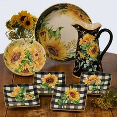 sunflowers and checkered dishes are displayed on a table