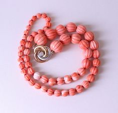 Carved Pumpkin  Momo Coral  Necklace 18k Gold Clasp & Diamond Natural Japanese carved momo coral necklace. Lovely pumpkin shape of beads!  The clasp is made from yellow and white gold 750 and decorated by diamond. Weight: 61gr Dimensions of beads - 15-6mm  Length - 53cm / 21in  Clasp dimensions - 22x21mm   Metal - yellow and white gold 750 (hallmark is present). Condition:  please see condition on photo! Some natural imperfections but not many. Please visit our other listings! We have many beaut Coral Accessories, Pumpkin Necklace, Carved Pumpkin, Jewelry Post, Coral Necklace, Pumpkin Carving, Beautiful Jewelry, Ukraine, Amber