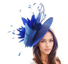 Royal Dark Blue Womens Kentucky Derby Hat Wedding Ascot Fascinator Headpiece Church Cocktail Tea Ladies Day Headband Hatinator Statement Royal Blue Adonis Sinamay & Feather Disc Fascinator Hat Royal Blue sinamay swirls trimmed with a mass of royal blue feathers and curled burnt feathers on a large royal blue sinamay base The hat base measures about 12 inches wide This royal blue fascinator is mounted with matching headband If you prefer a headband to match your hair, please make a note at check Blue Curved Brim Headpiece For Royal Ascot, Blue Hats For Kentucky Derby Event, Blue Curved Brim Headpiece For Kentucky Derby, Blue Hat For Royal Ascot Event, Blue Hat Headpiece For Races, Blue Headpiece For Kentucky Derby, Blue Mini Hats For Royal Ascot Event, Blue Mini Hats For Royal Ascot, Blue Mini Hat With Short Brim For Races