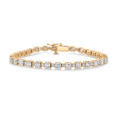 A true heirloom piece from the REEDS Exclusive ECONIC Diamond collection is sure to add an unparalleled sparkle to any ensemble. Crafted in 14k yellow gold, this timeless tennis bracelet is lined with alternating round lab grown diamonds. The diamonds are 7ctw, H in color and VS2 in clarity. This bracelet measures 7.25 inches length and 3.5mm in width. REEDS exclusive ECONIC Diamonds are lab grown in a technologically advanced facility, allowing us to offer laboratory created diamonds that posse Classic Channel Set Diamond Bracelet, Classic Diamond Tennis Bracelet With Channel Set, Classic Diamond Tennis Bracelet Channel Set, Classic Channel Set Tennis Bracelet For Anniversary, Classic Tennis Bracelet Channel Set For Anniversary, Classic Yellow Gold Diamond Cut Tennis Bracelet, Classic Yellow Gold Tennis Bracelet With Diamond Accents, Classic Diamond Bracelet With Channel Set, Classic Round Cut Channel Set Diamond Bracelet