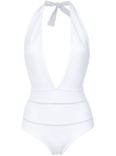 White halterneck swimsuit from Amir Slama featuring a deep V neck. Swimwear must be tried on over your own garments. This item is true to fit. Please note this item has a brazilian cut. Spring Swimsuit, Halter Top Bathing Suits, Leopard Print Swimsuit, Designer Beach Wear, Halter Neck Swimsuit, Brazilian Cut, Cut Out Swimsuits, White Swimsuit, Printed Maxi Skirts