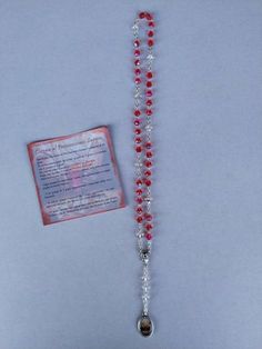 Rosary crown of the Precious Blood of Jesus, handmade with grains in the middle red and white crystal. Rosary length cm 34.5 diameter grains mm 6. With enamelled medal and accompanied explanatory lens for the correct recitation of the rosary. For an excellent success of the delivery we ask you to leave a telephone number to be delivered to the courier. The online sale of sacred statues, icons, silverware, religious items and gifts comes from twenty years of experience in the sector. This ensures Red Crystal Bracelet For Gift, Red Crystal Bracelet Gift, Red Beaded Spiritual Crystal Necklace, Adjustable Red Rosary With 8mm Beads, Spiritual Red Crystal Bracelet With Faceted Beads, Red Spiritual Crystal Bracelet With Faceted Beads, Red Rosary Beads For Jewelry Making, Red Beaded Rosary For Spiritual Use, Adjustable Red Rosary With Round Beads