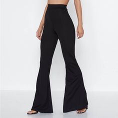 Black High Rise Fit Flare Stretchy Pants | 6 X Nasty Gal Brand New Without Tags. Features A Lightweight Stretchy Material, High Waist, And Flare Leg. Versatile Enough For Dressing Up On A Night Out Or Doing Yoga! Size 6 Waist Measures 12” Rise Is 11” Inseam 31” Ankle Opening 12” Stretchy Pants, How To Do Yoga, Fit & Flare, Stretchy Material, Night Out, High Waist, High Rise, Dress Up, Size 6