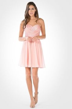 Be a trendsetter in this short strapless dress with sequined sweetheart bodice by Poly USA 7716. This chiffon cocktail dress features a strapless sweetheart neckline adorned with sequins and satin stripes. An embellished back, short A-line skirt, and a zipper closure complete this beautiful look. Affordably priced at $150, this dress is perfect for any formal event and will keep you on budget! Designer: Poly USA Style Number: 7716 Material: Chiffon, 100% Polyester Details: Bra Cups, Fully Lined Colors: Aqua, Navy Blue, Pink, Red, Off-White This item ships within 1 to 2 business days. Short Strapless Dress, Strapless Dresses Short, Red Strapless Dress, Pink Strapless Dress, Military Ball Dresses, Chiffon Cocktail Dress, Sequined Top, Strapless Sweetheart Neckline, Off White Dresses