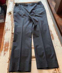 "Vintage 1980's Original DAK DO London New York All buttons and zipper work as designed Wool Pants Nice clean used vintage shape 32.5\" Inseam 2.5\" extra material in hem for possible expansion of length 37\" Waist" Vintage Tailored Bottoms With Pockets, Tailored Vintage Bottoms With Pockets, Vintage Straight Leg Pants For Business Casual, Vintage Straight Leg Bottoms For Business Casual, Vintage Fitted Pants For Business Casual, Fitted Vintage Pants For Business Casual, Vintage Fitted Work Pants, Vintage Flat Front Workwear Bottoms, Vintage Tailored Bottoms For Workwear