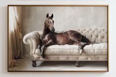 a brown horse laying on top of a white couch