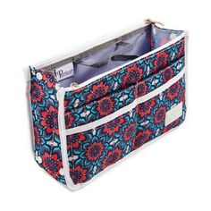 a blue and red flowered bag with white trim