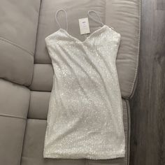 White Sequin Dress Bought For Bach Party Never Worn Nwt Size Large. Im 5'8 And Dress Wasnt Too Short For Me. Super Cute And Fun White Mini Dress For Date Night Holiday, Short White Sparkly Dress, White Sleeveless Mini Dress For Holidays, Holiday White Sleeveless Mini Dress, White Sequin Mini Dress For Date Night, White Mini Sequin Dress For Date Night, White Sequin Dress For Date Night In Party Season, White Sequin Dress For Date Night During Party Season, White Sequin Dress For Date Night And Party Season