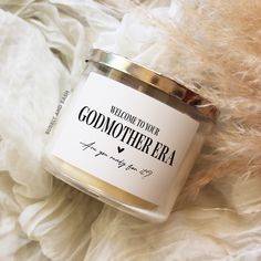 there is a candle that says welcome to our godmother ea