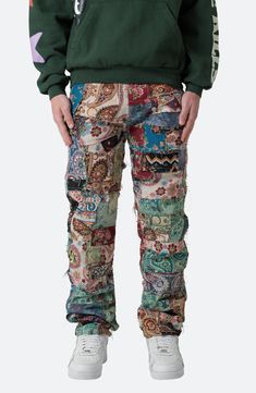 A patchwork of mixed custom jacquard woven blanket pieces creates these unique pants cut in a relaxed fit for the ultimate laid-back look. 32" inseam; 16" leg opening; 11 3/4" front rise Button fly Five-pocket style 100% polyester Machine wash, dry flat Imported Multicolor Straight Leg Patchwork Pants, Multicolor Straight Leg Pants With Patchwork, Multicolor Patchwork Straight Leg Pants, Unique Pants, Swag Pics, Hype Beast, Stylish Pants, Woven Blanket, Jacquard Weave